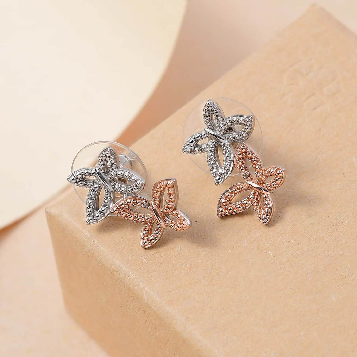 Karis Natural Champagne Diamond Accent Butterfly Earrings in 18K RG Plated and Platinum Bond image number 1