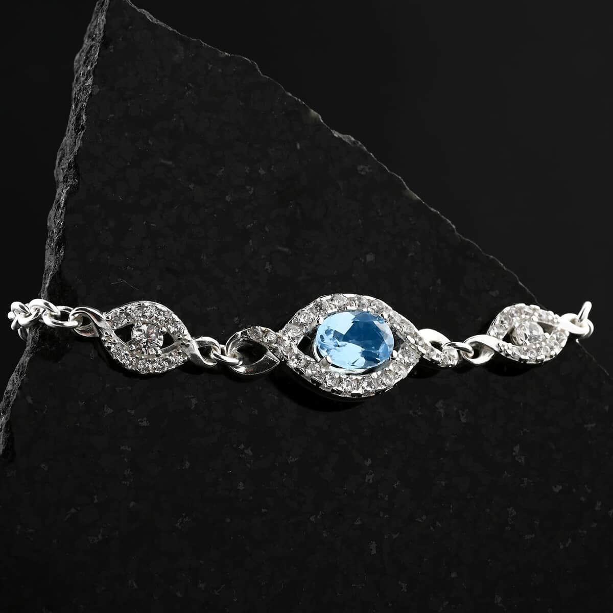 Blue Topaz and Simulated Diamond 2.15 ctw Bracelet in Sterling Silver (7.50 In) image number 1