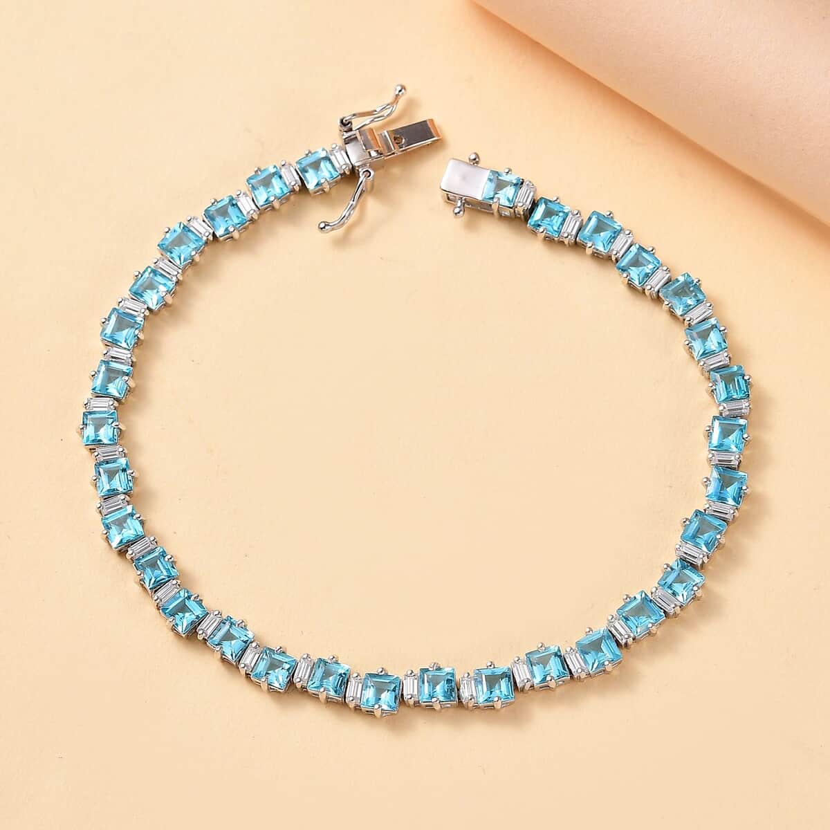 Premium Betroka Blue Apatite and Moissanite 12.50 ctw Sea Waves Bracelet in Rhodium Over Sterling Silver (7.25 In) image number 1