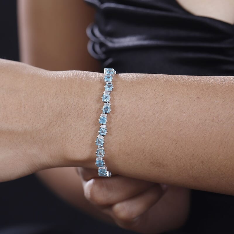 D'Joy Premium Betroka Blue Apatite and Moissanite 12.50 ctw Sea Waves Bracelet in Rhodium Over Sterling Silver (7.25 In)