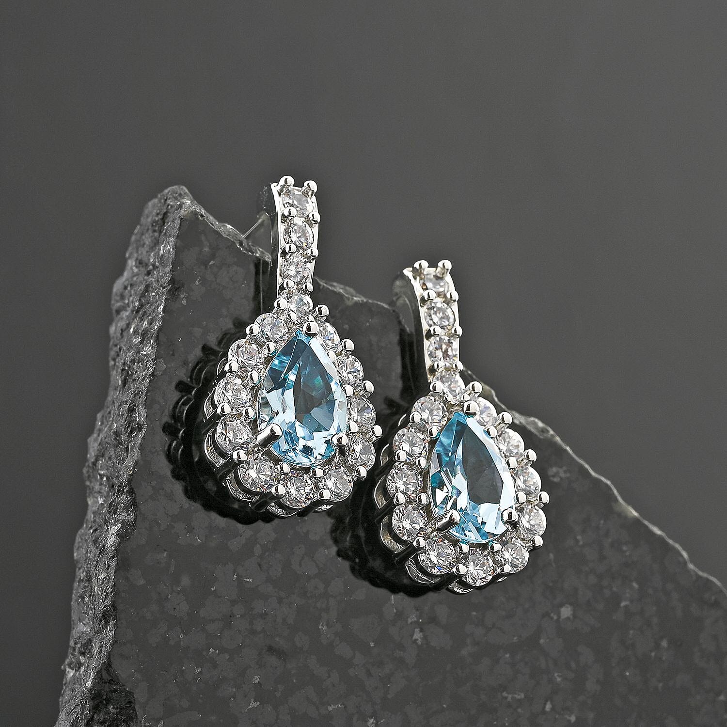 Blue Topaz and Simulated Diamond 5.80 ctw Earrings in Silvertone