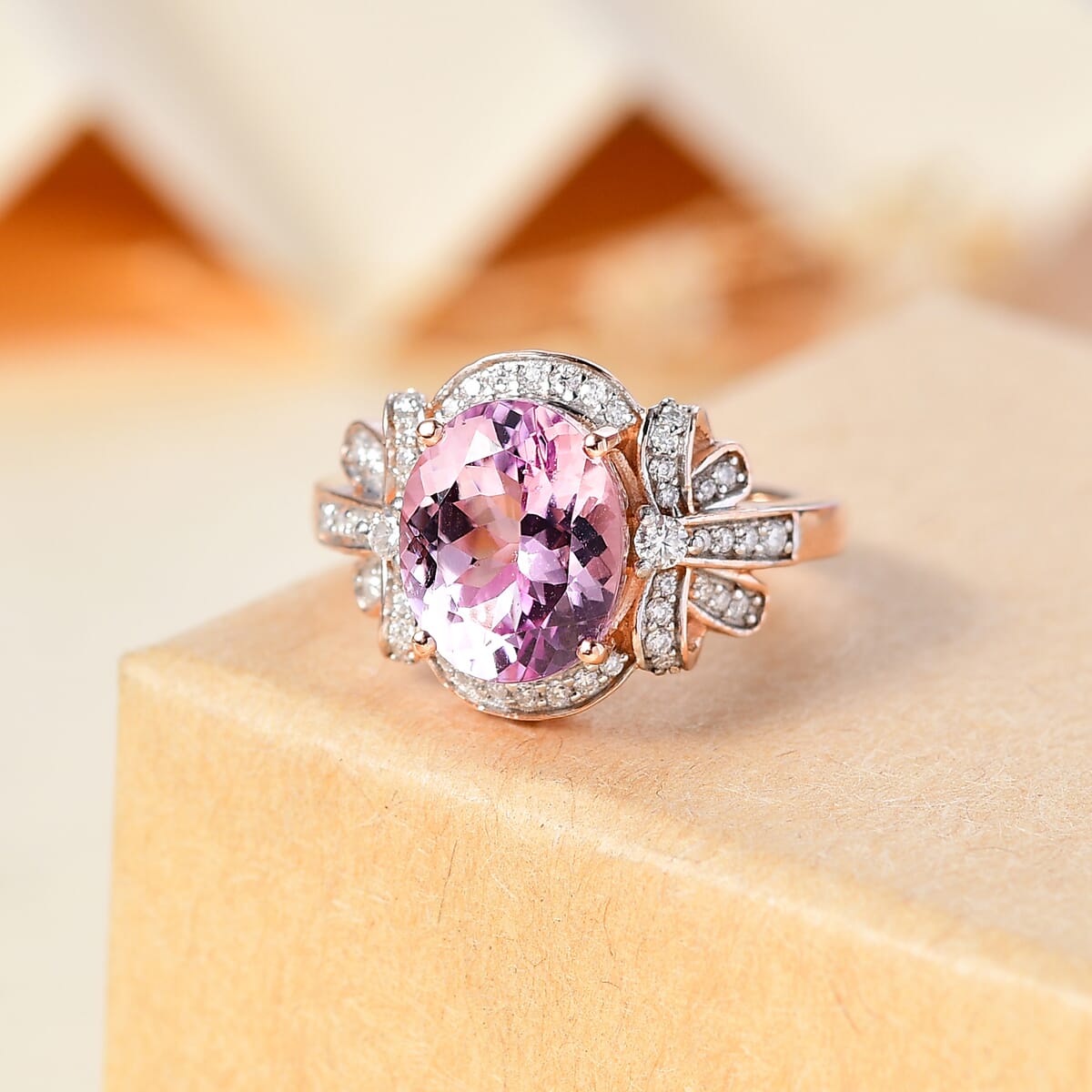 Martha Rocha Kunzite and Moissanite 4.50 ctw Love Knot Ring in 18K Vermeil Rose Gold Over Sterling Silver (Size 9.0) image number 1