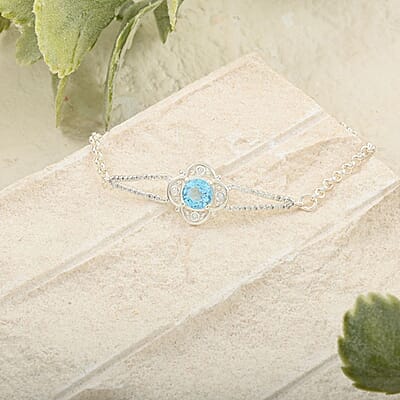 Blue Topaz and Simulated Diamond 1.40 ctw Bracelet in Sterling Silver (7.50 In)
