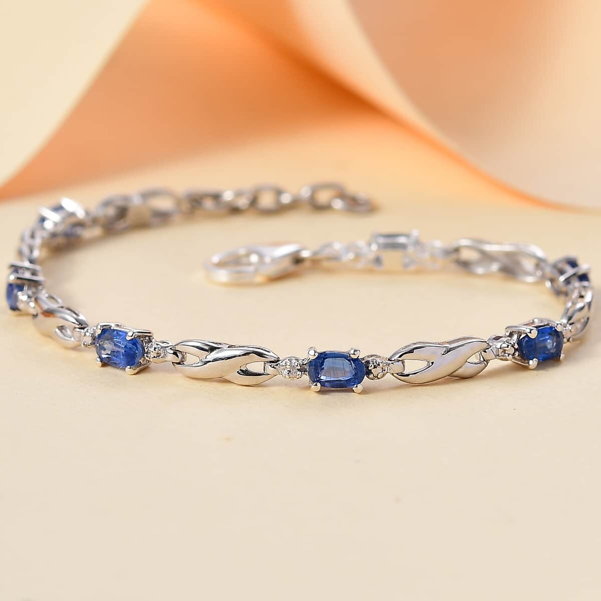 Tanzanite 2.10 ctw Infinity Bracelet in Rhodium Over Sterling Silver (8.00 In) image number 1