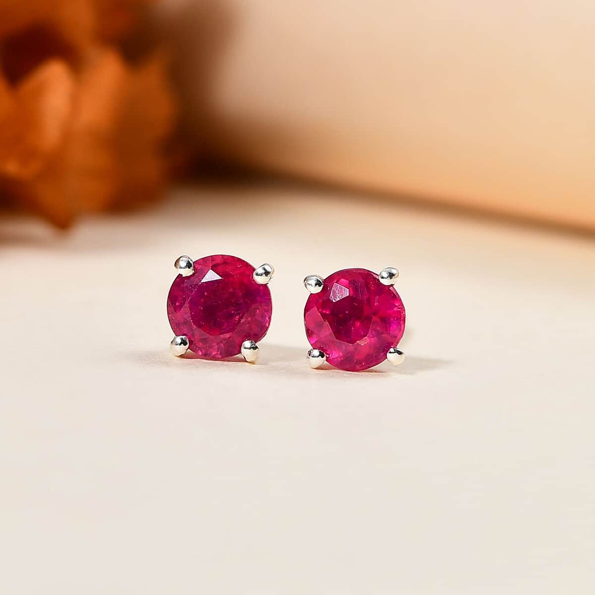 Premium Niassa Ruby (FF) 1.50 ctw Solitaire Stud Earrings in Rhodium Over Sterling Silver image number 1