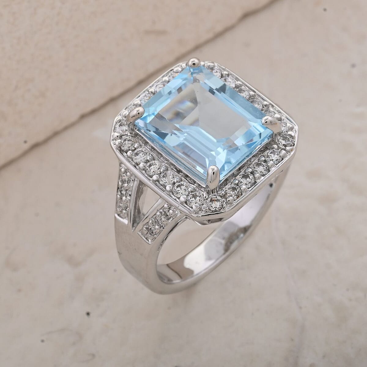 Blue Topaz and Simulated Diamond 5.10 ctw Ring in Silvertone (Size 7.0) image number 1