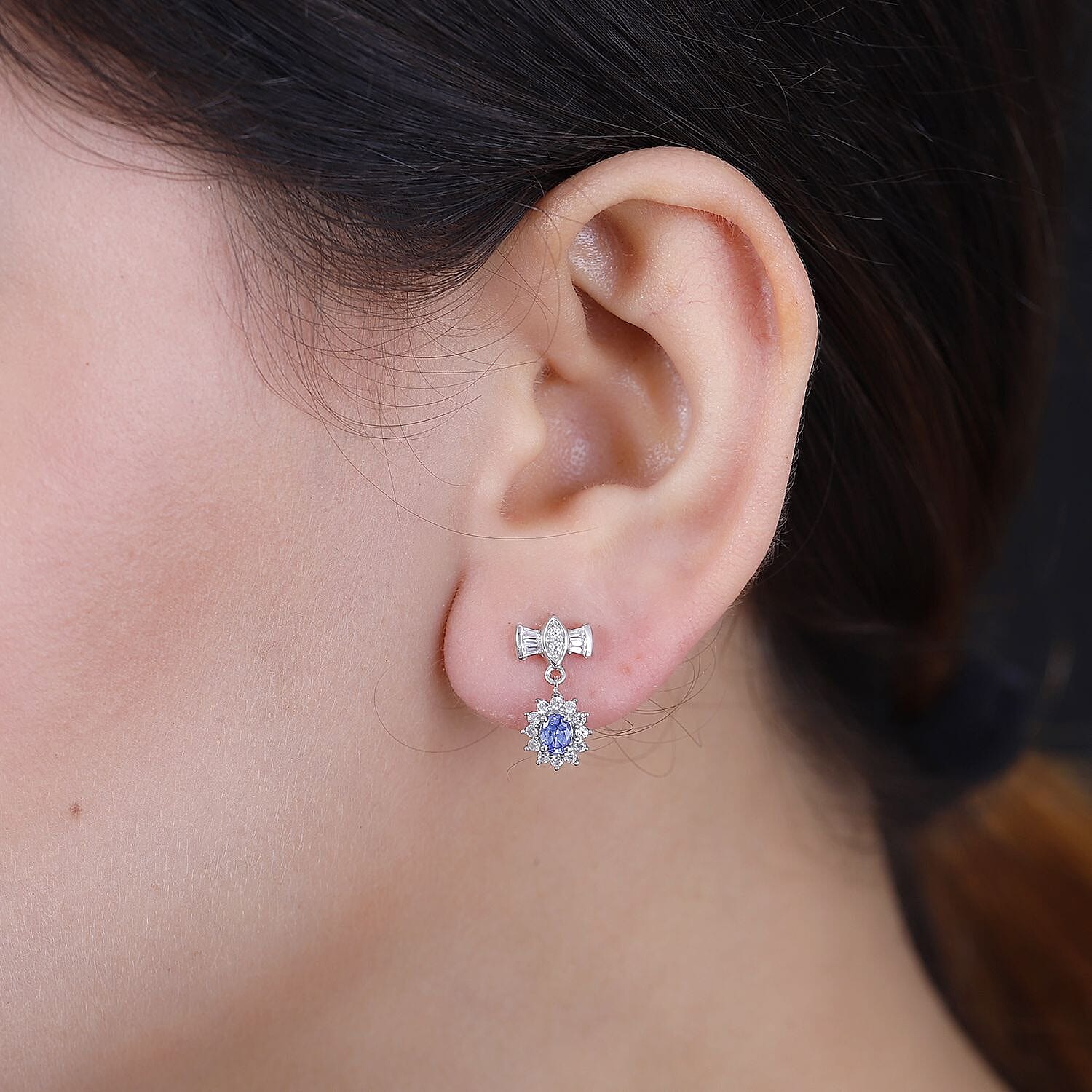 D'Joy Ceylon Blue Sapphire and White Zircon 1.20 ctw Bow Earrings in Rhodium Over Sterling Silver