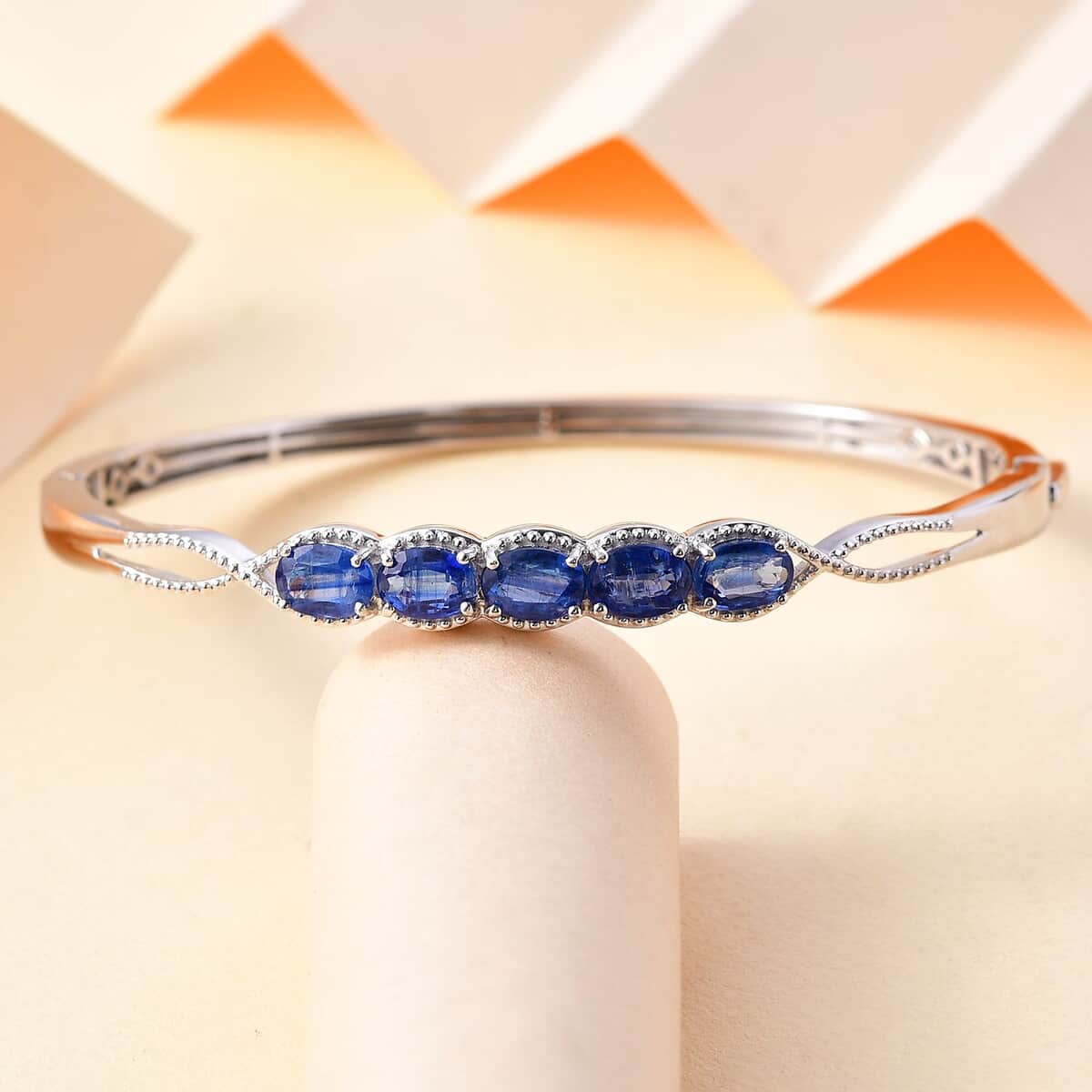 Kashmir Kyanite 4.90 ctw Love Infinity Bangle Bracelet in Rhodium Over Sterling Silver (7.25 In)  image number 1