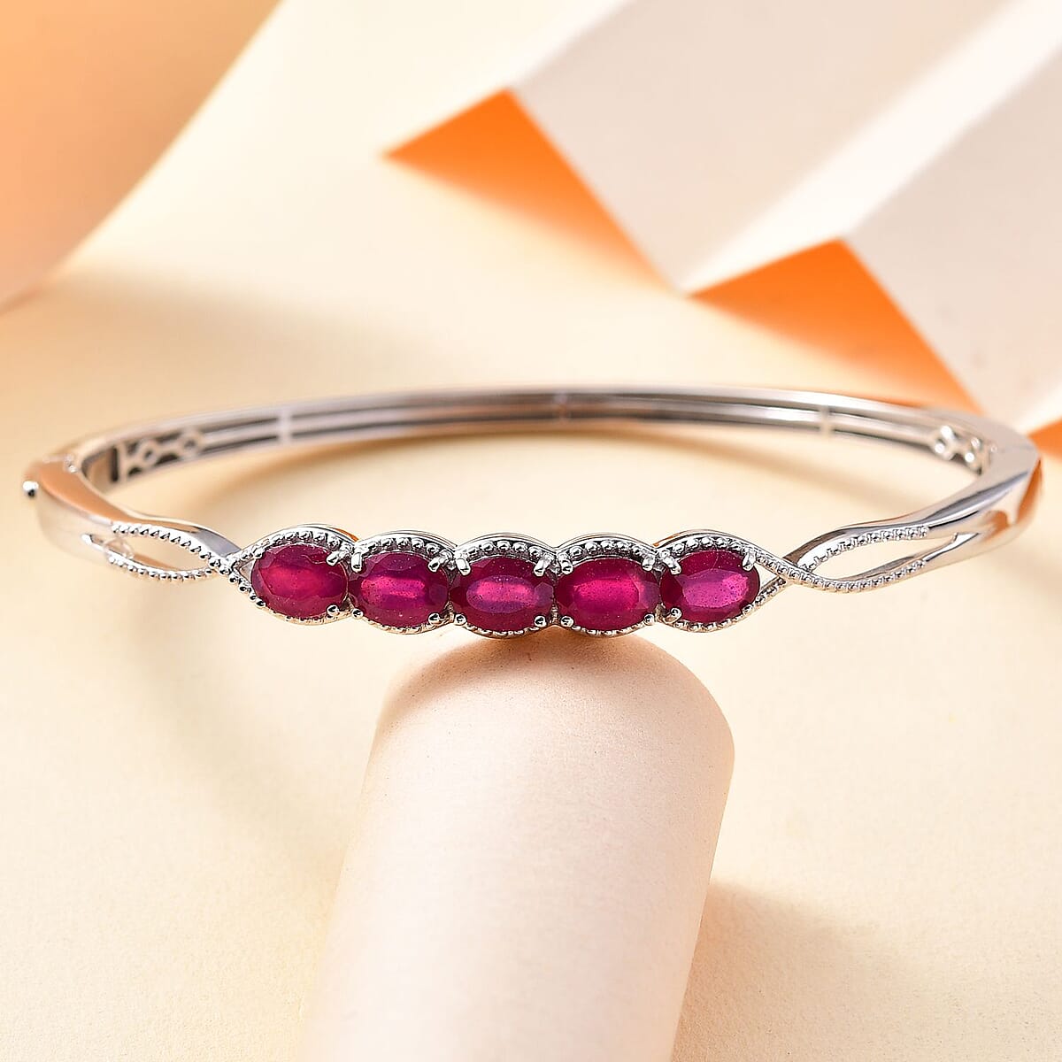 Niassa Ruby (FF) 6.30 ctw Love Infinity Bangle Bracelet in Rhodium Over Sterling Silver (7.25 In)  image number 1