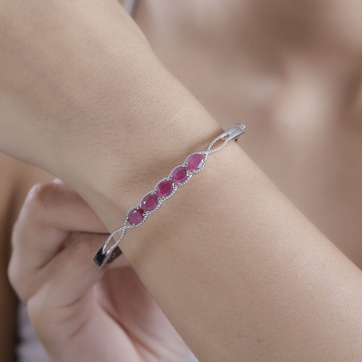Niassa Ruby (FF) 6.30 ctw Love Infinity Bangle Bracelet in Rhodium Over Sterling Silver (7.25 In)  image number 2