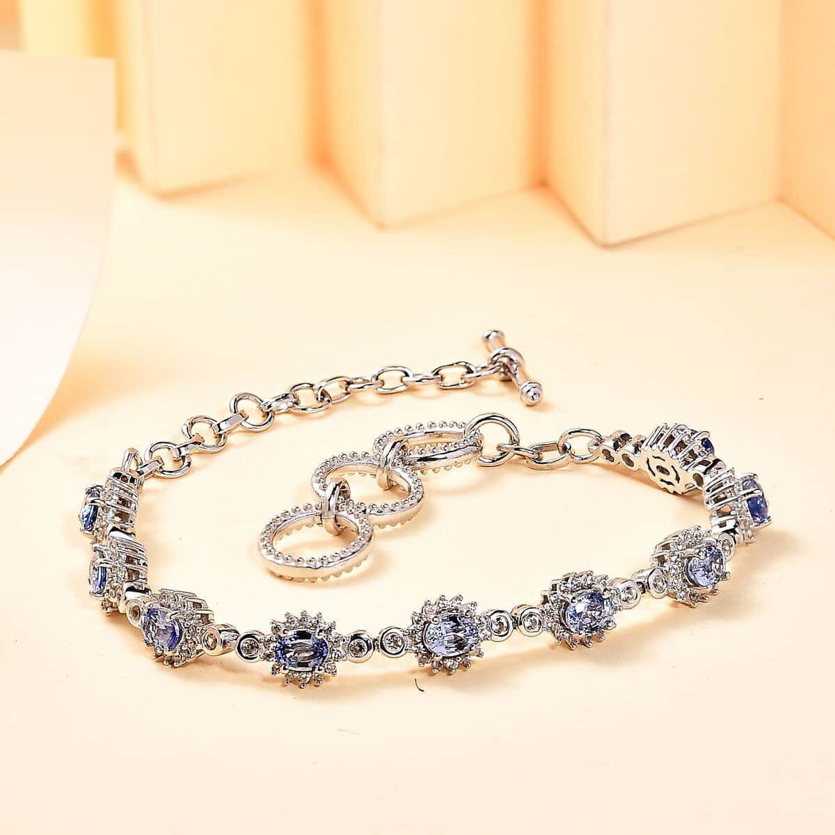 Ceylon Blue Sapphire and White Zircon 4.35 ctw Art Deco Bracelet in Rhodium Over Sterling Silver (6.50-8.0In) image number 1