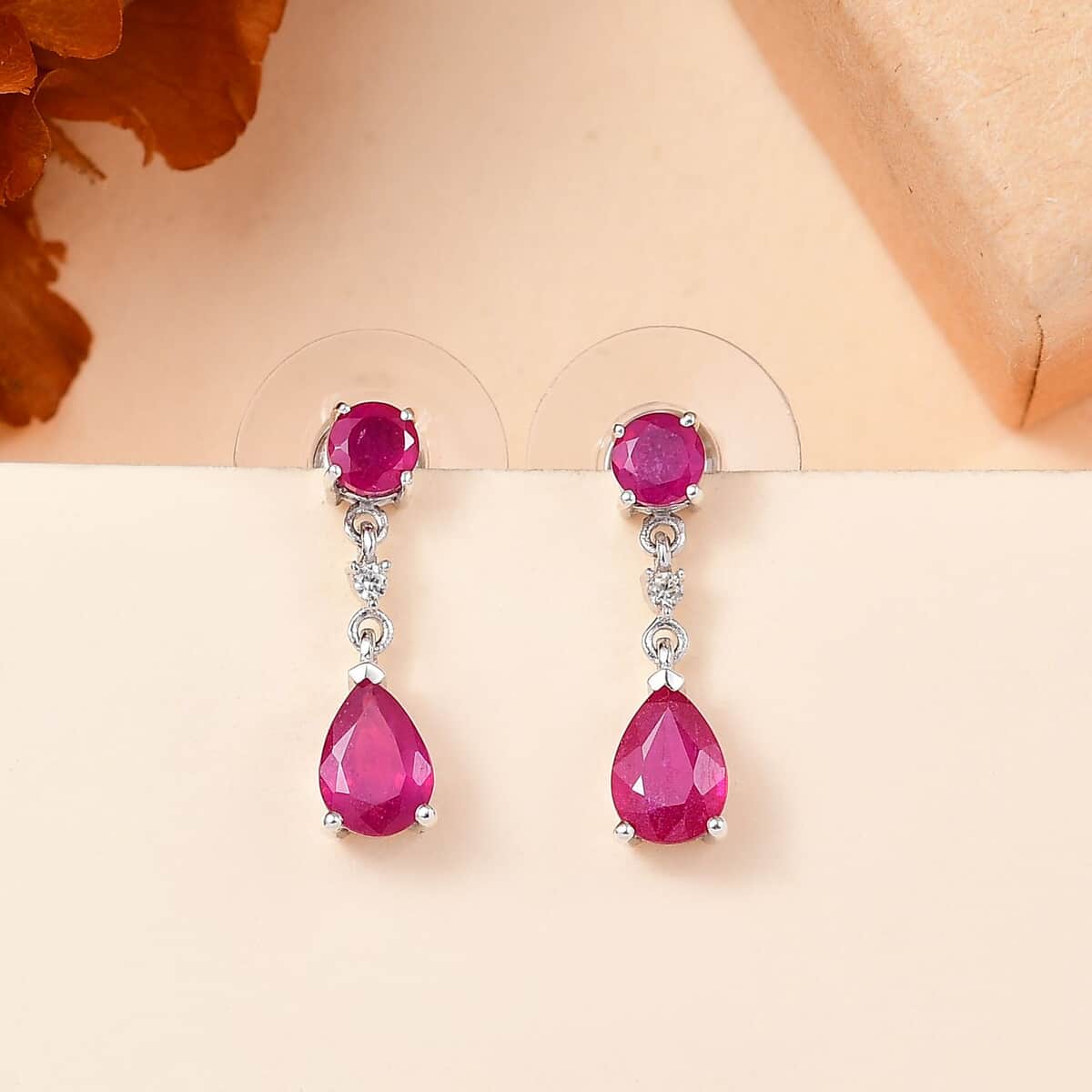 Niassa Ruby (FF) and White Zircon 2.70 ctw Drop Earrings in Rhodium Over Sterling Silver image number 1