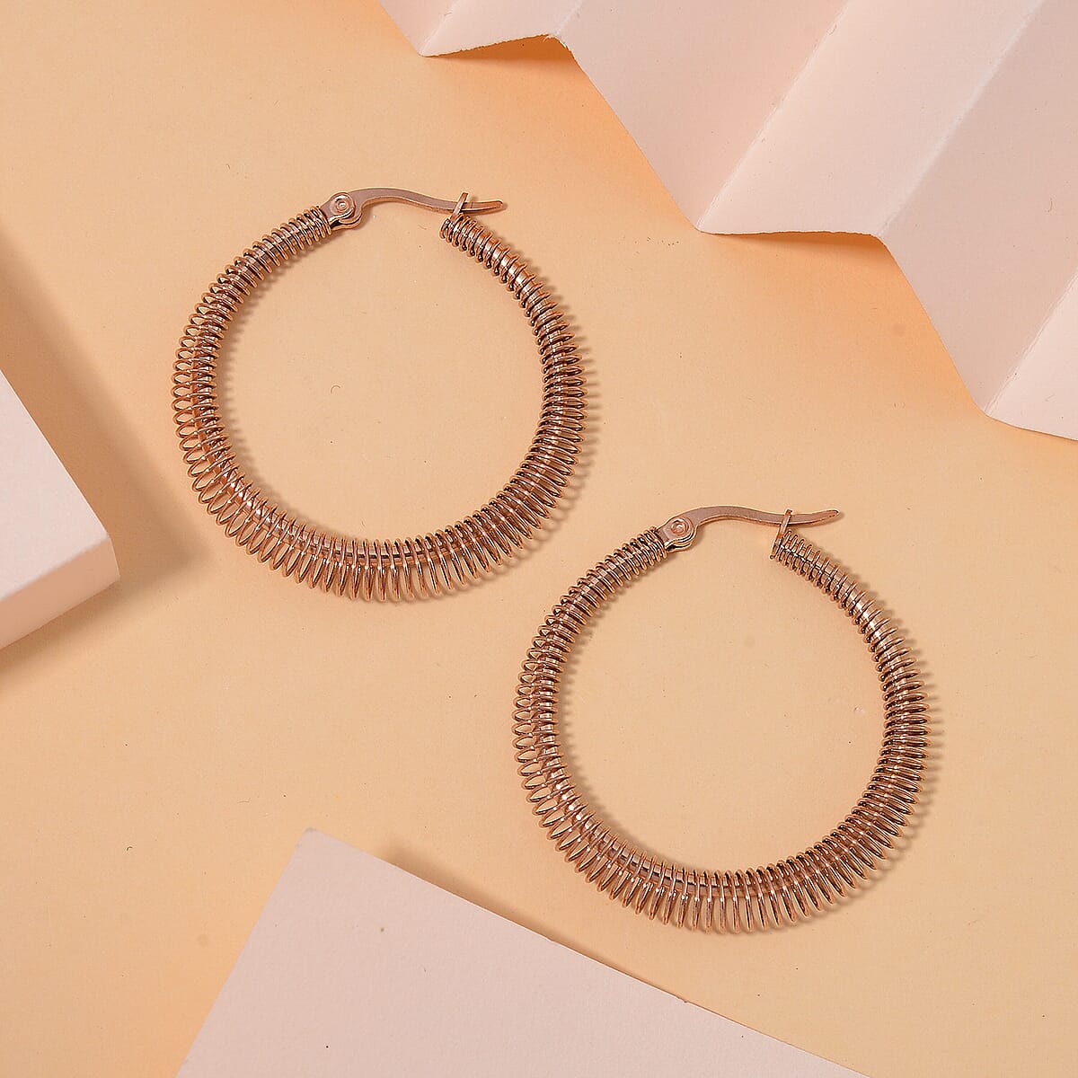 Textured Hoop Earrings in ION Plated RG Stainless Steel image number 1