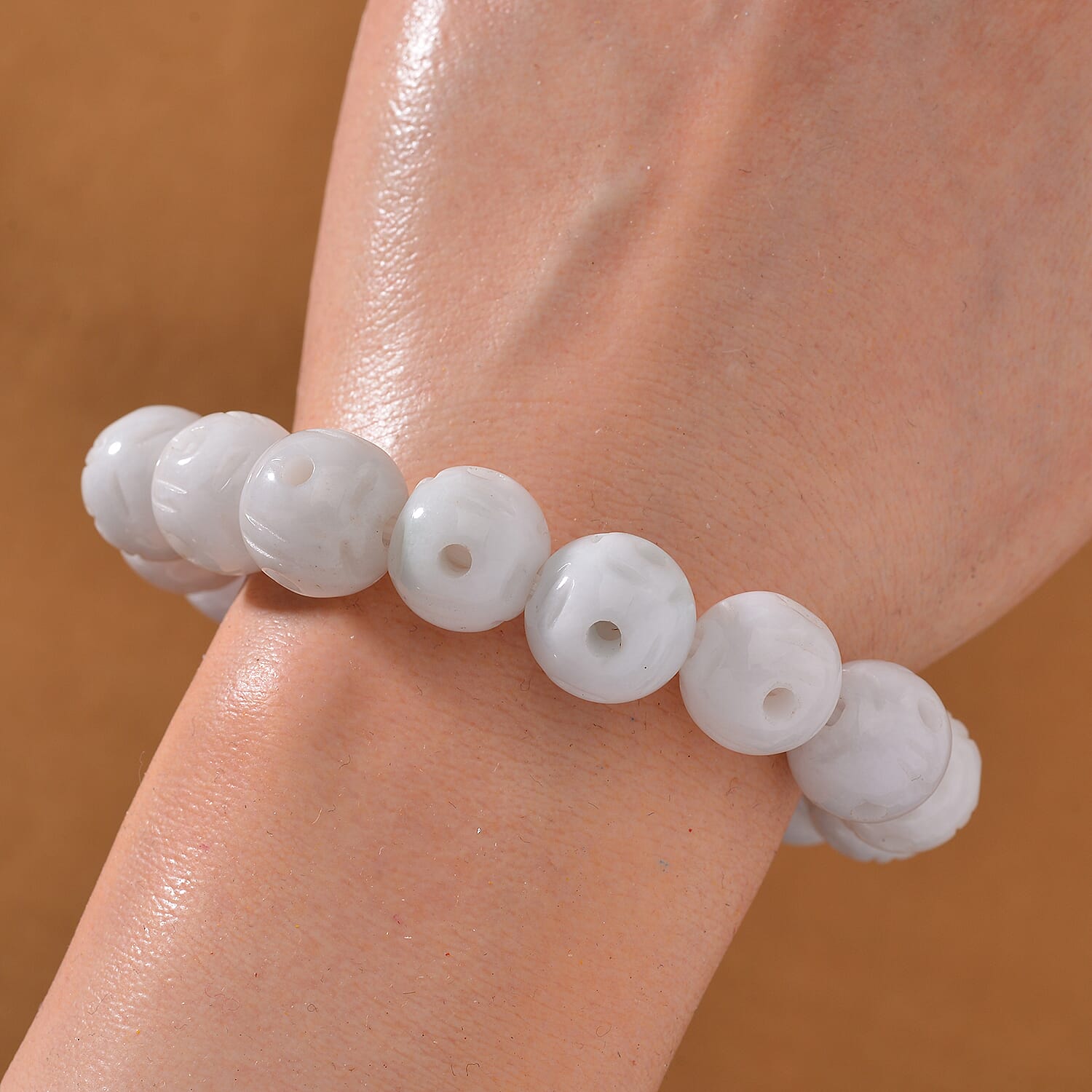 Natural Jade 240.00 ctw Carved Beaded Stretch Bracelet