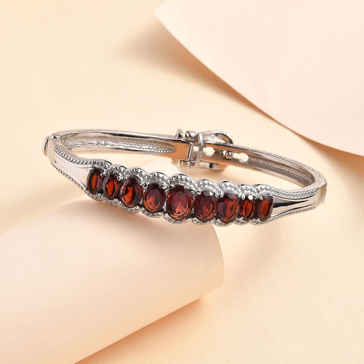 Mozambique Garnet 7.25 ctw Bangle Bracelet in Stainless Steel (6.50 In) image number 1