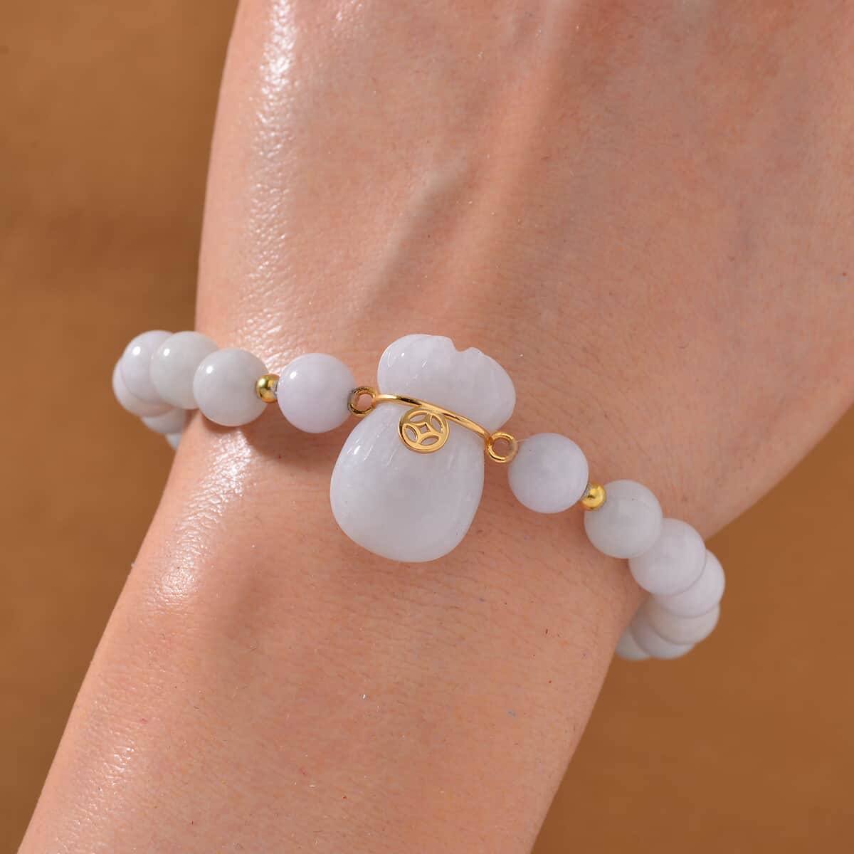 Natural Jade 130.00 ctw Carved and Beaded Stretch Bracelet with Money Lucky Bag Charm in 14K YG Over Sterling Silver image number 1