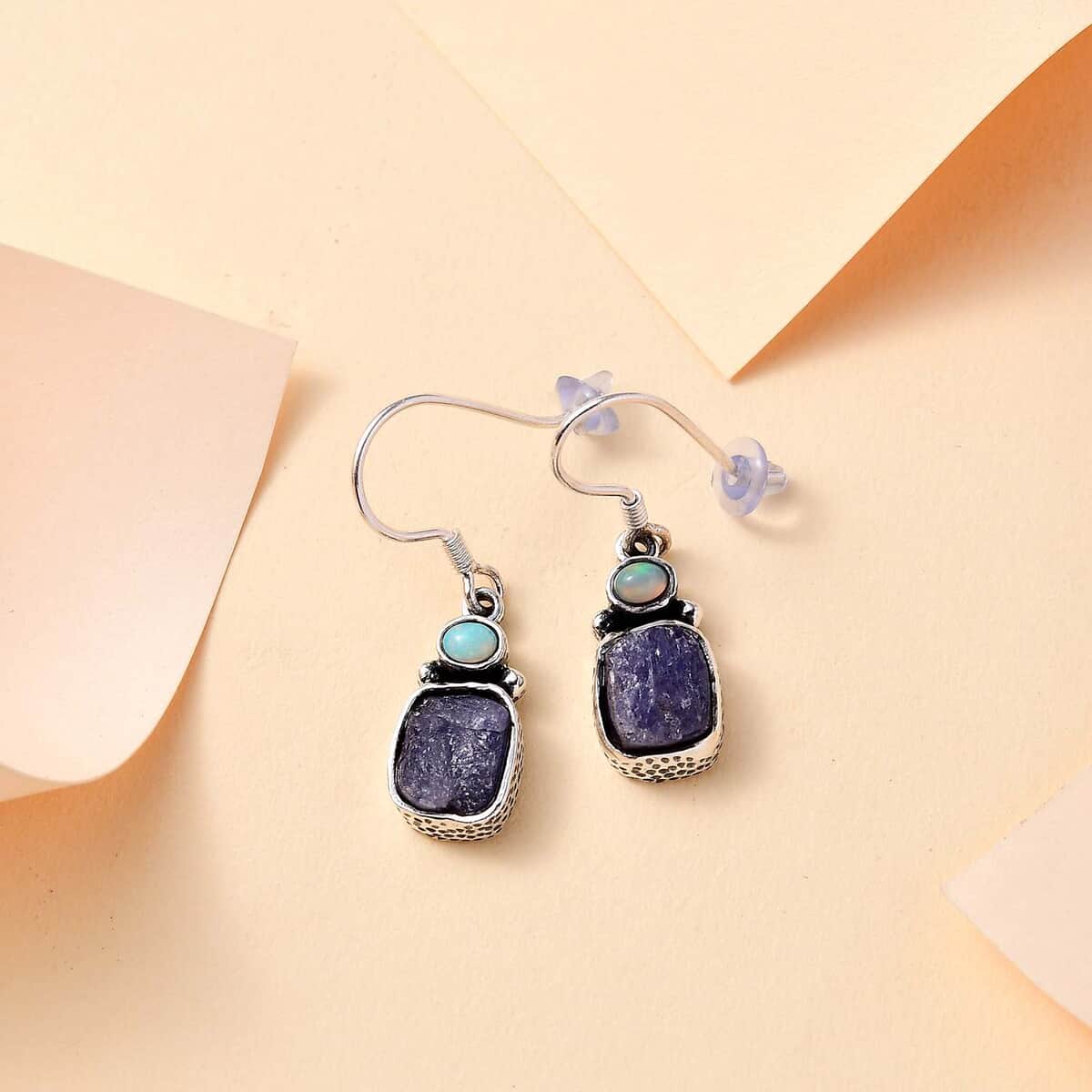 Artisan Crafted Rough Cut Tanzanite and Ethiopian Welo Opal 10.75 ctw Dangle Earrings in Sterling Silver image number 1