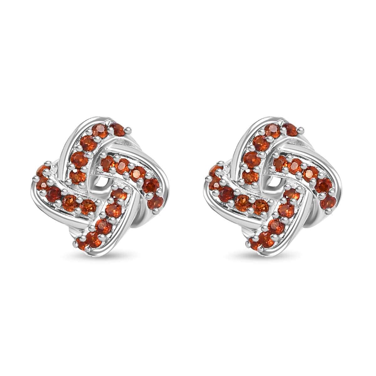 Mozambique Garnet 0.50 ctw Knot Stud Earrings in Rhodium Over Sterling Silver image number 0