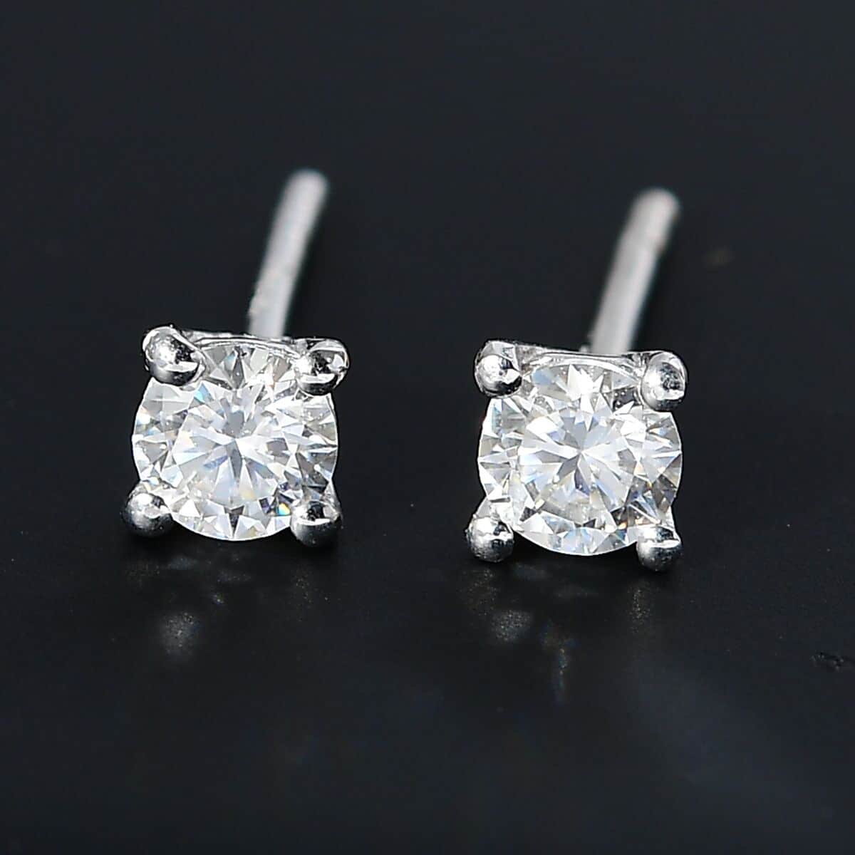 Moissanite 0.50 ctw Solitaire Stud Earrings in Rhodium Over Sterling Silver (Del. in 7-10 days) image number 1