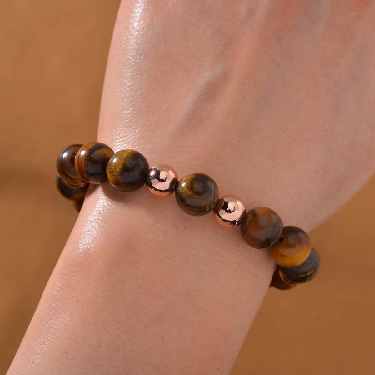 Tigers Eye Beaded Stretch Bracelet in 14K RG Over Copper 110.00 ctw image number 1