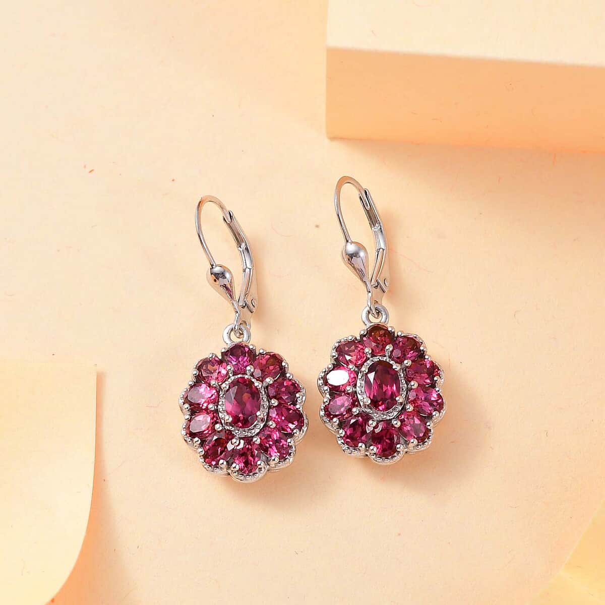 Tanzanian Wine Garnet 5.15 ctw Bloom Radiance Earrings in Rhodium Over Sterling Silver  image number 1