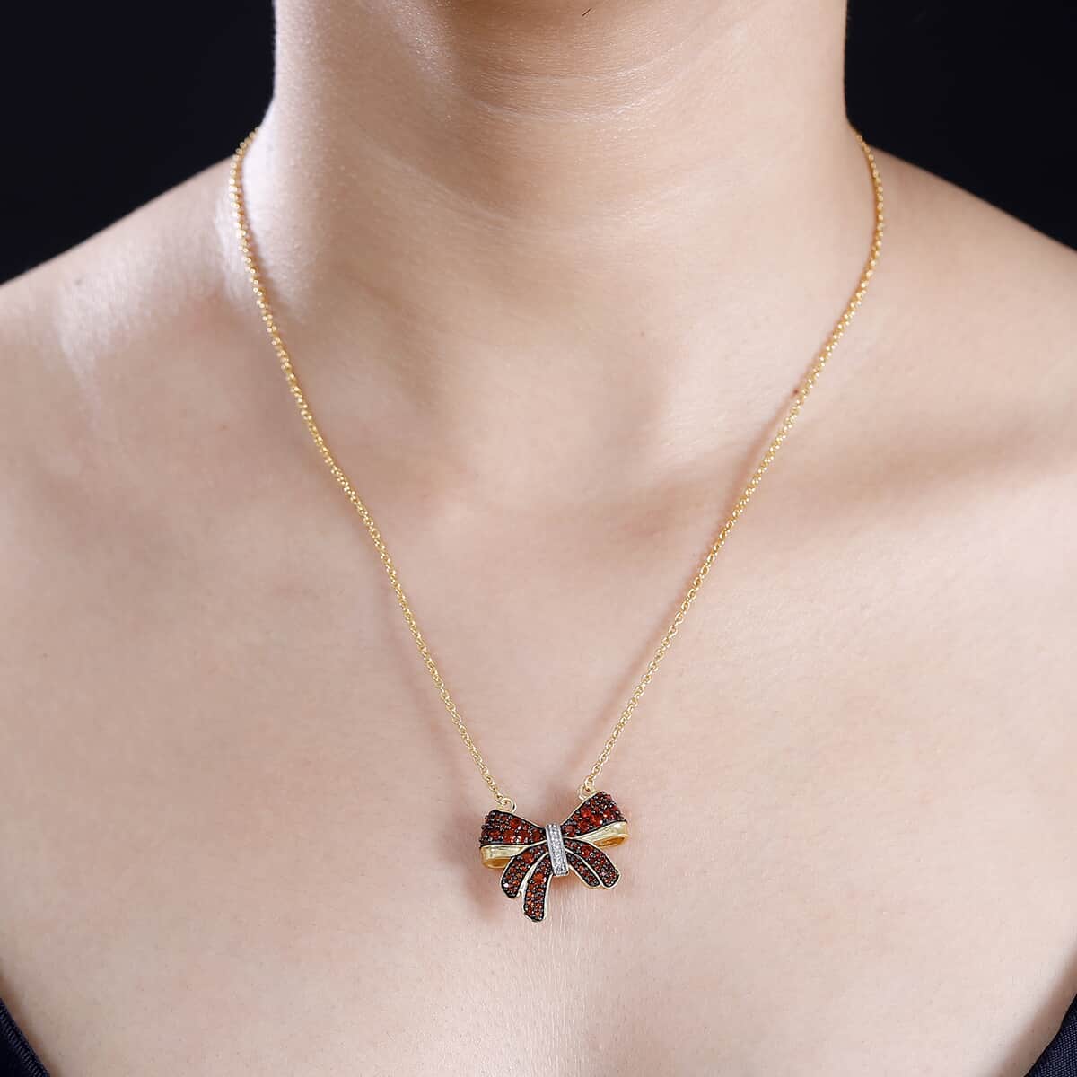 Karis Mozambique Garnet and White Zircon 1.60 ctw Bow Knot Necklace in 18K Yellow Gold Plated with ION Plated YG Steel Chain 18 Inches image number 2