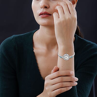 Quartz Movement Blue Topaz and Simulated Diamond 1.45 ctw Infinity Knot Cuff Bracelet Watch (6.00-7.00 In) in Silvertone
