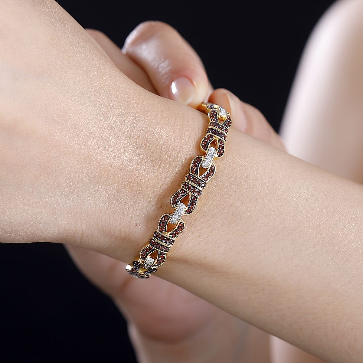Karis Mozambique Garnet and White Zircon 3.15 ctw Bow Knot Bracelet in 18K Yellow Gold Plate (8.00 In) image number 2
