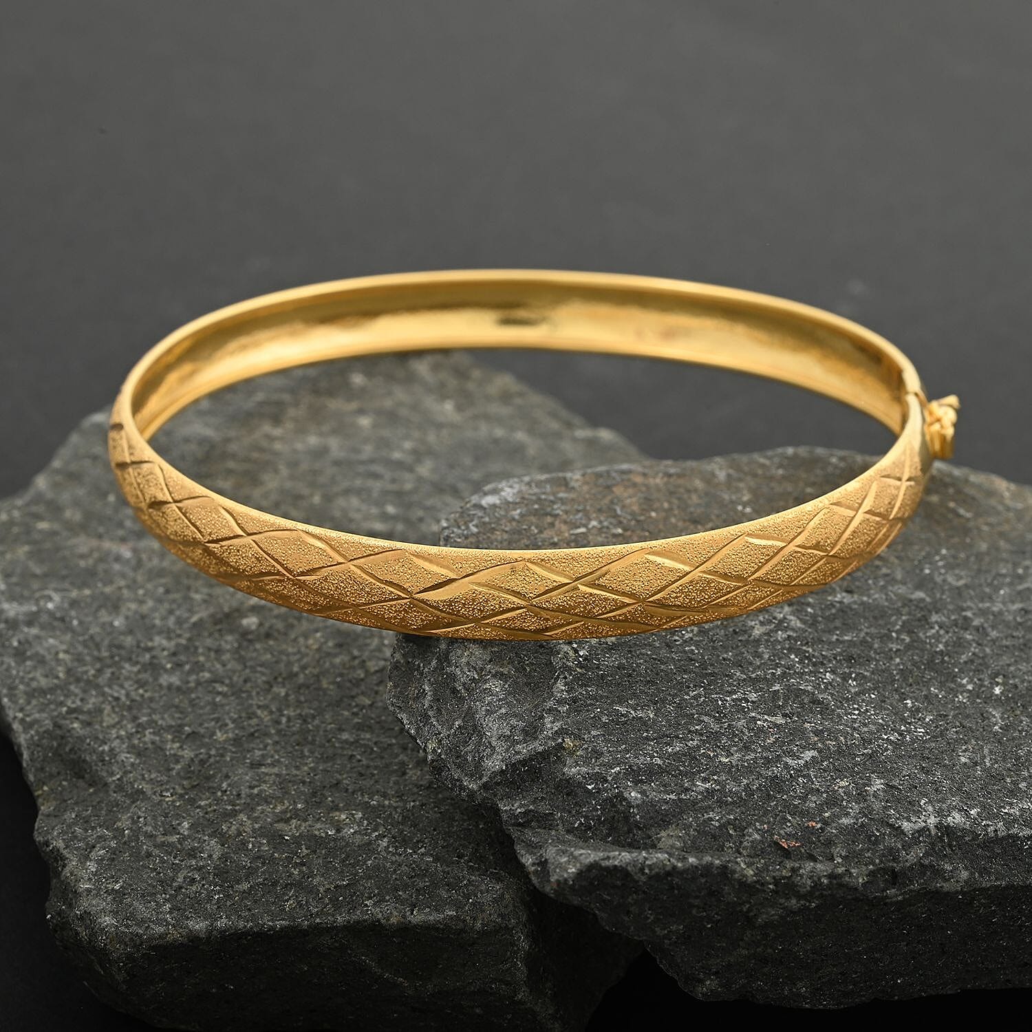 Diamond-cut Bangle Bracelet in 14K Yellow Gold Over Sterling Silver (7.50 In) 5.40 Grams