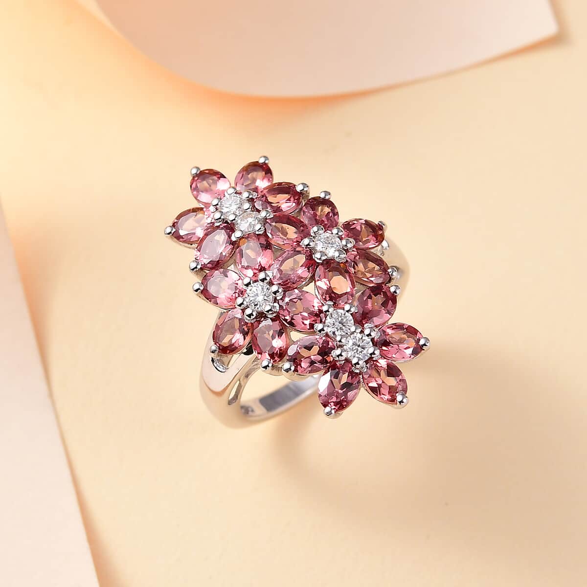 Tanzanian Blush Garnet and Moissanite 5.00 ctw Bunch of Flower Ring in Rhodium Over Sterling Silver (Size 7.0) image number 1