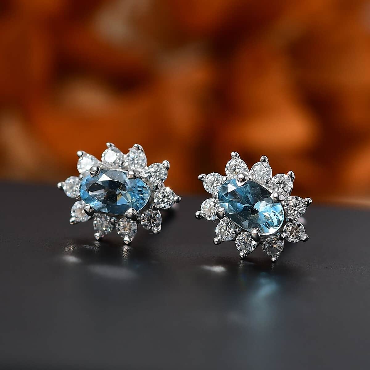 Santa Maria Aquamarine and Moissanite 0.85 ctw Sunburst Earrings in Rhodium Over Sterling Silver image number 1