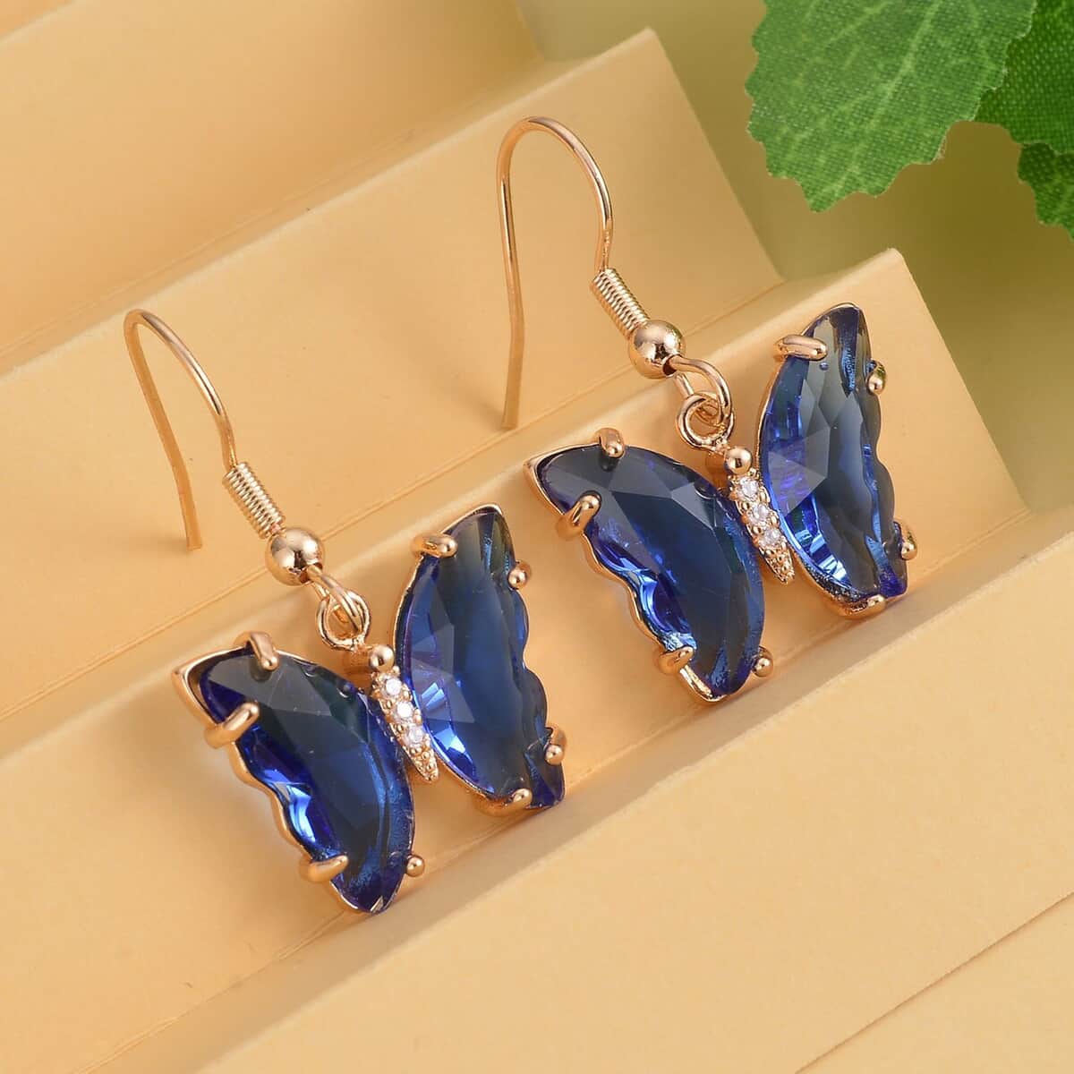 Simulated Blue Sapphire and Simulated Diamond Butterfly Earrings in Goldtone 0.10 ctw image number 1