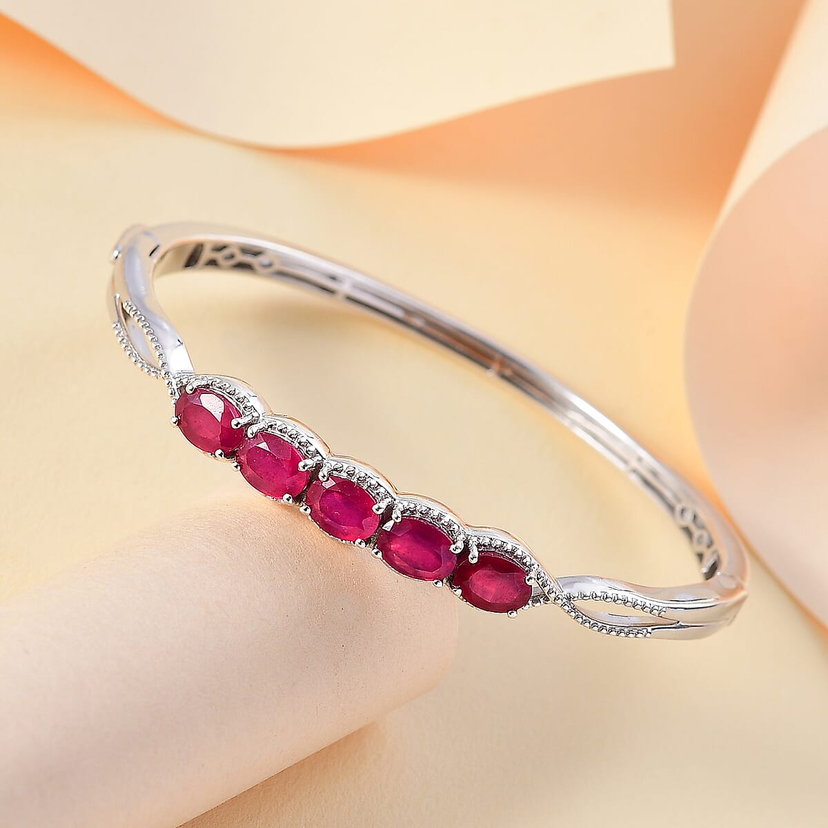 Niassa Ruby (FF) 6.30 ctw Love Infinity Bangle Bracelet in Rhodium Over Sterling Silver (8.0 In) image number 1