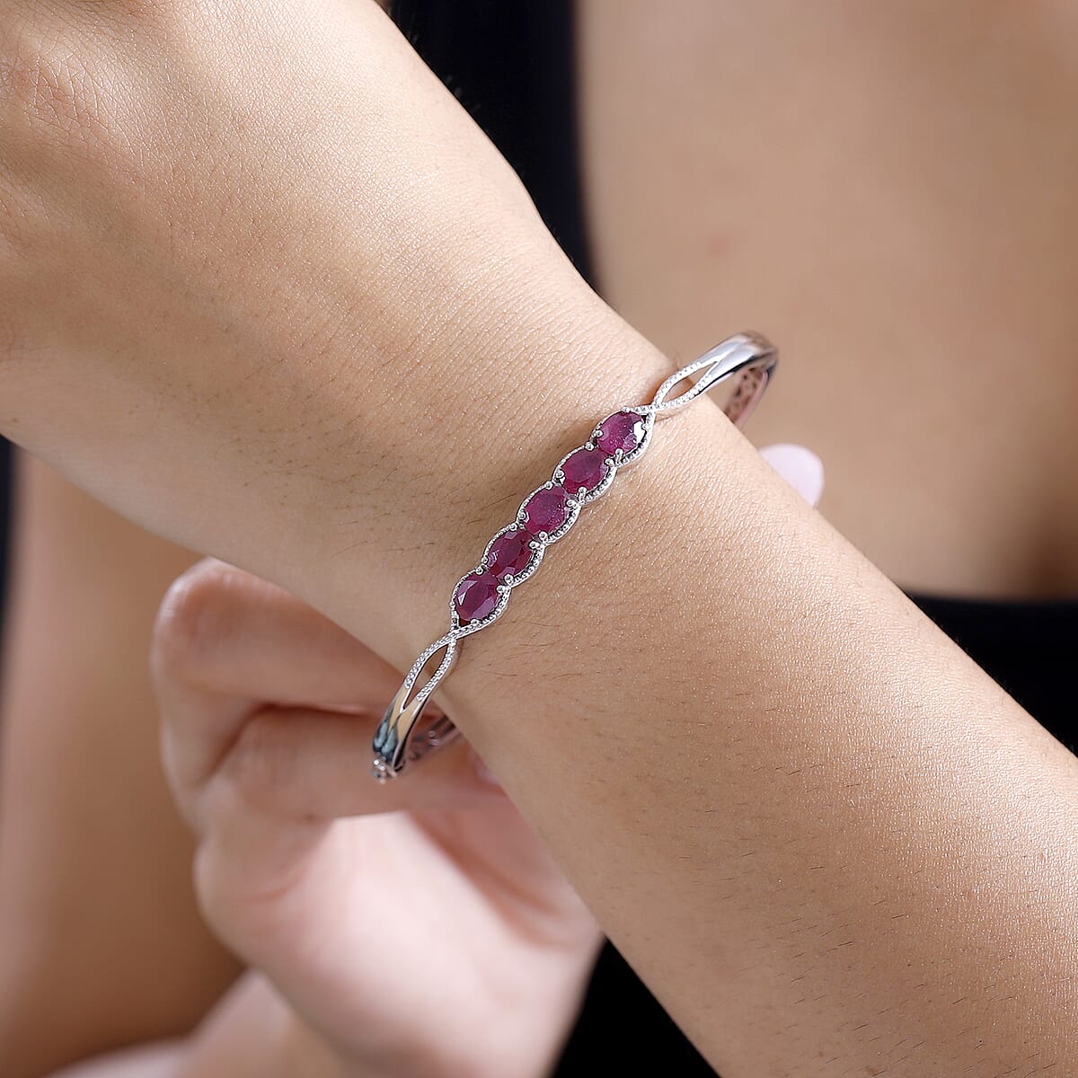Niassa Ruby (FF) 6.30 ctw Love Infinity Bangle Bracelet in Rhodium Over Sterling Silver (8.0 In) image number 2