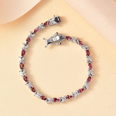 D'Joy Premium Tanzanian Blush Garnet and Moissanite 7.70 ctw Butterfly Bracelet in Rhodium Over Sterling Silver (8.00 In)