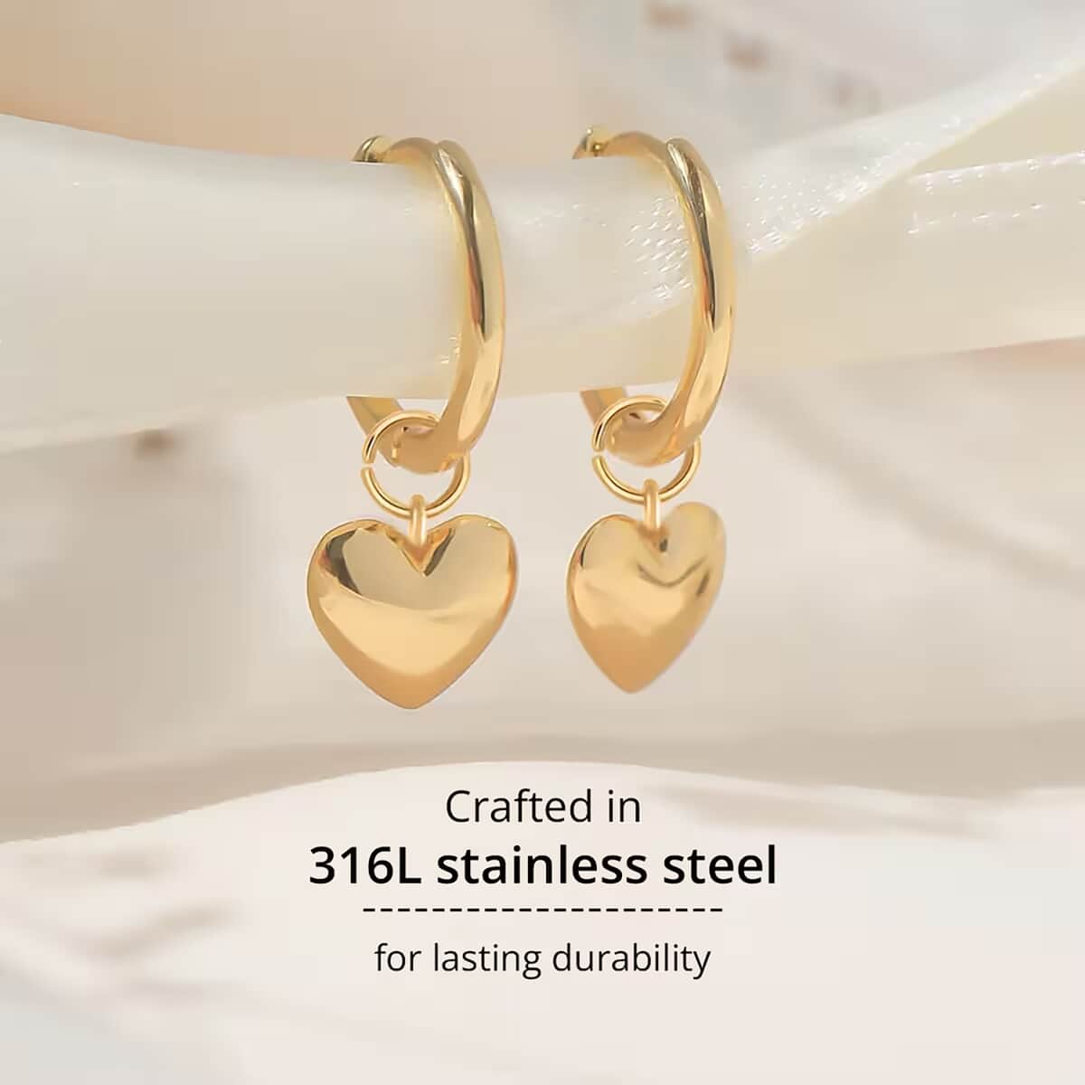 Heart Hoop Earrings in ION Plated Yellow Gold Stainless Steel image number 2