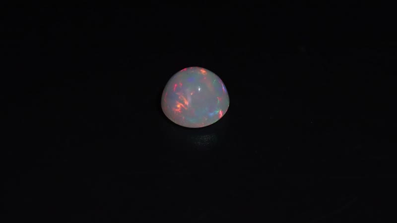 Ethiopian Welo Opal (Rnd 9 mm) 1.51 ctw Loose Gemstone