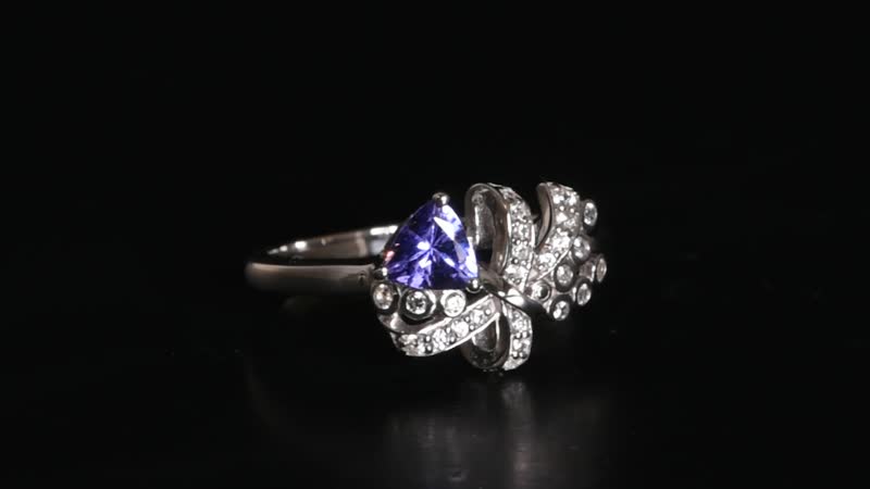 Tanzanite, White Zircon Love Knot Ring in Rhodium Over Sterling Silver (Size 10.0) 1.10 ctw