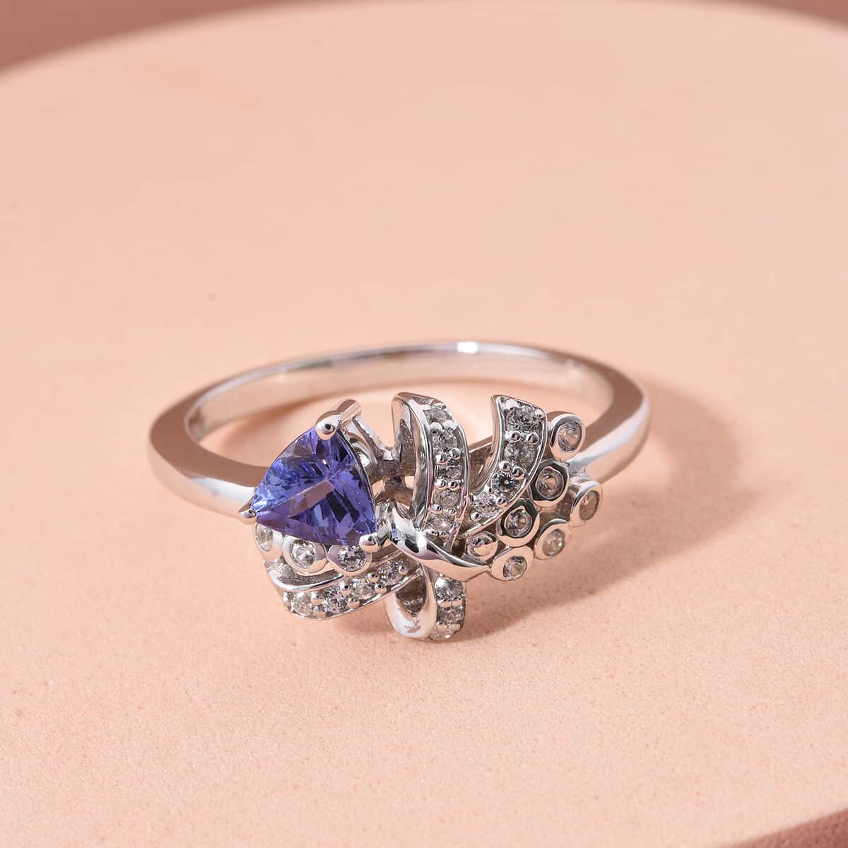 Tanzanite and White Zircon 0.65 ctw Love Knot Ring in Rhodium Over Sterling Silver (Size 10.0) image number 1