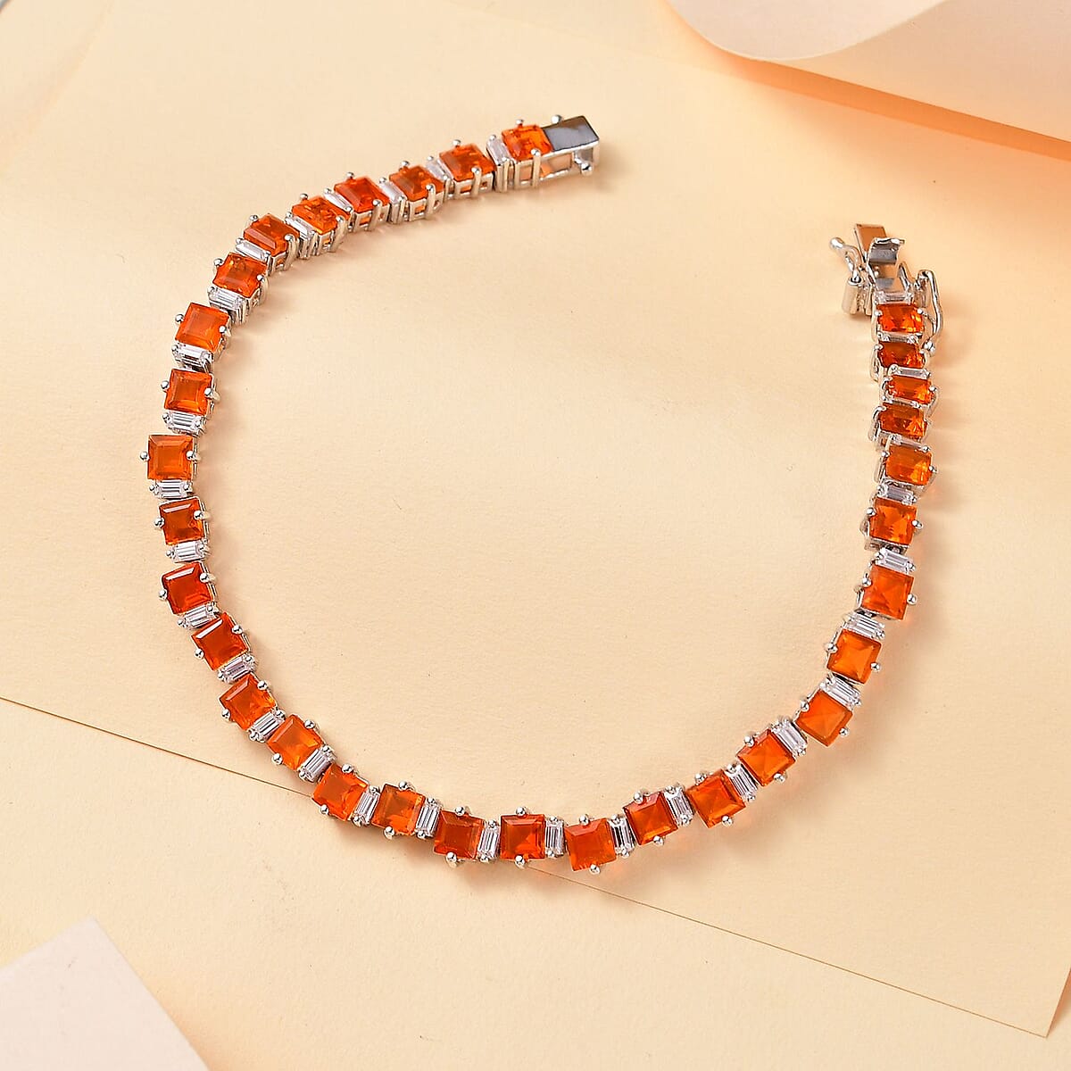 D'Joy Salamanca Fire Opal and Moissanite 9.85 ctw Sea Waves Bracelet in Rhodium Over Sterling Silver (8.00 In) image number 1