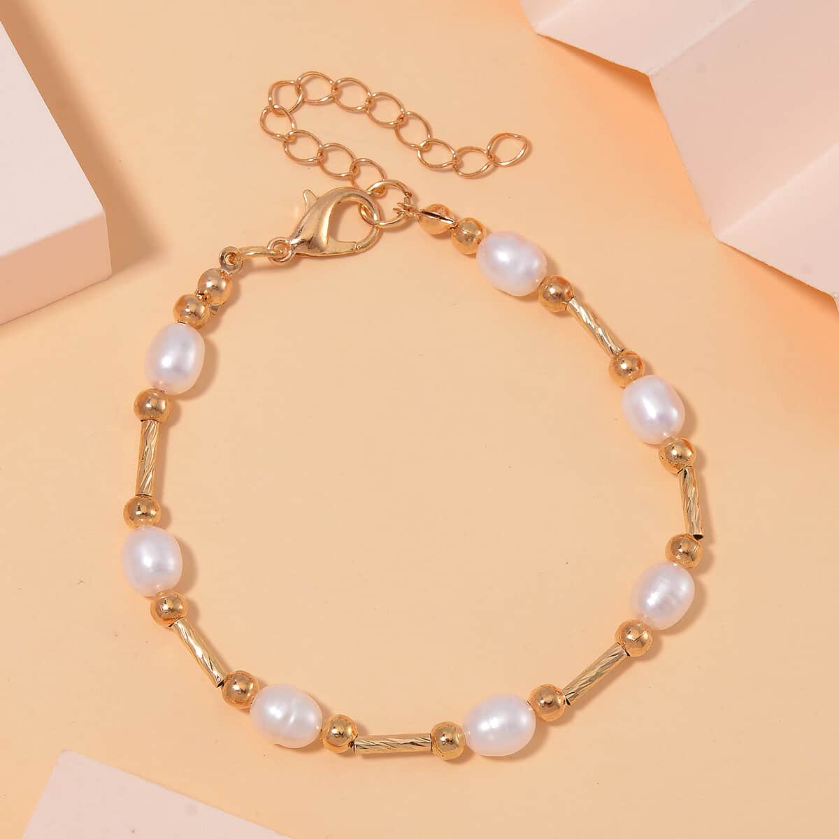 White Freshwater Pearl Station Bracelet in Goldtone (7.00-9.00In) image number 1