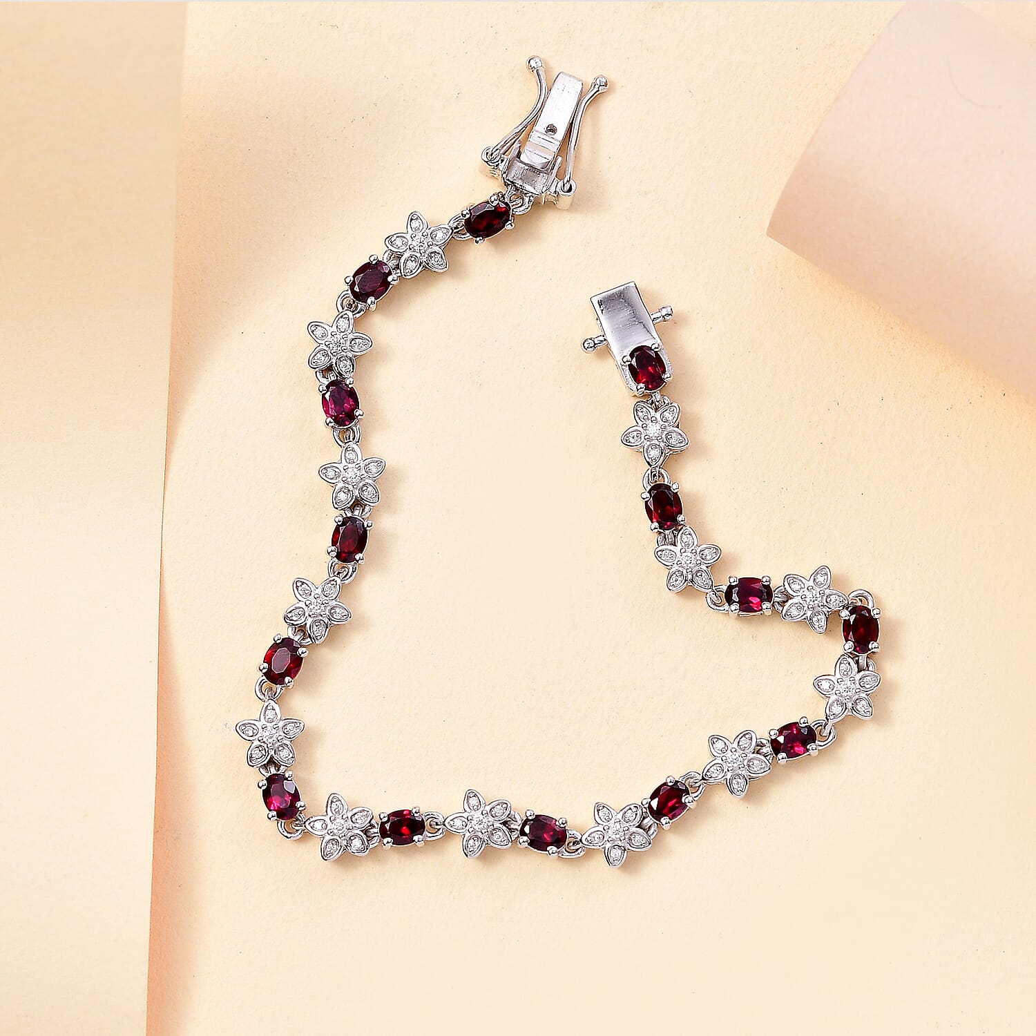 D'Joy Premium Anthill Garnet and Moissanite 4.80 ctw Flower Bracelet in Rhodium Over Sterling Silver (6.50 In)