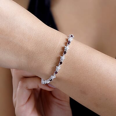 D'Joy Premium Anthill Garnet and Moissanite 4.80 ctw Flower Bracelet in Rhodium Over Sterling Silver (6.50 In)