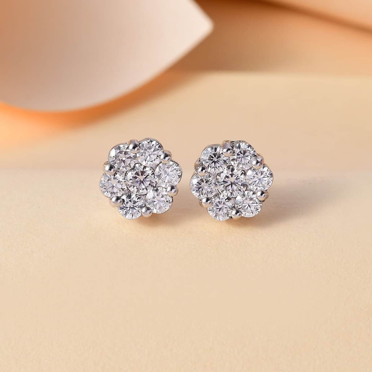 Moissanite 1.50 ctw Floral Stud Earrings in Rhodium Over Sterling Silver image number 1