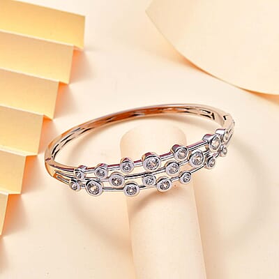 J Francis Embellished with Zirconia by Swarovski 8.70 ctw Bubbles Bangle Bracelet in Rhodium Over Sterling Silver (7.25 In)