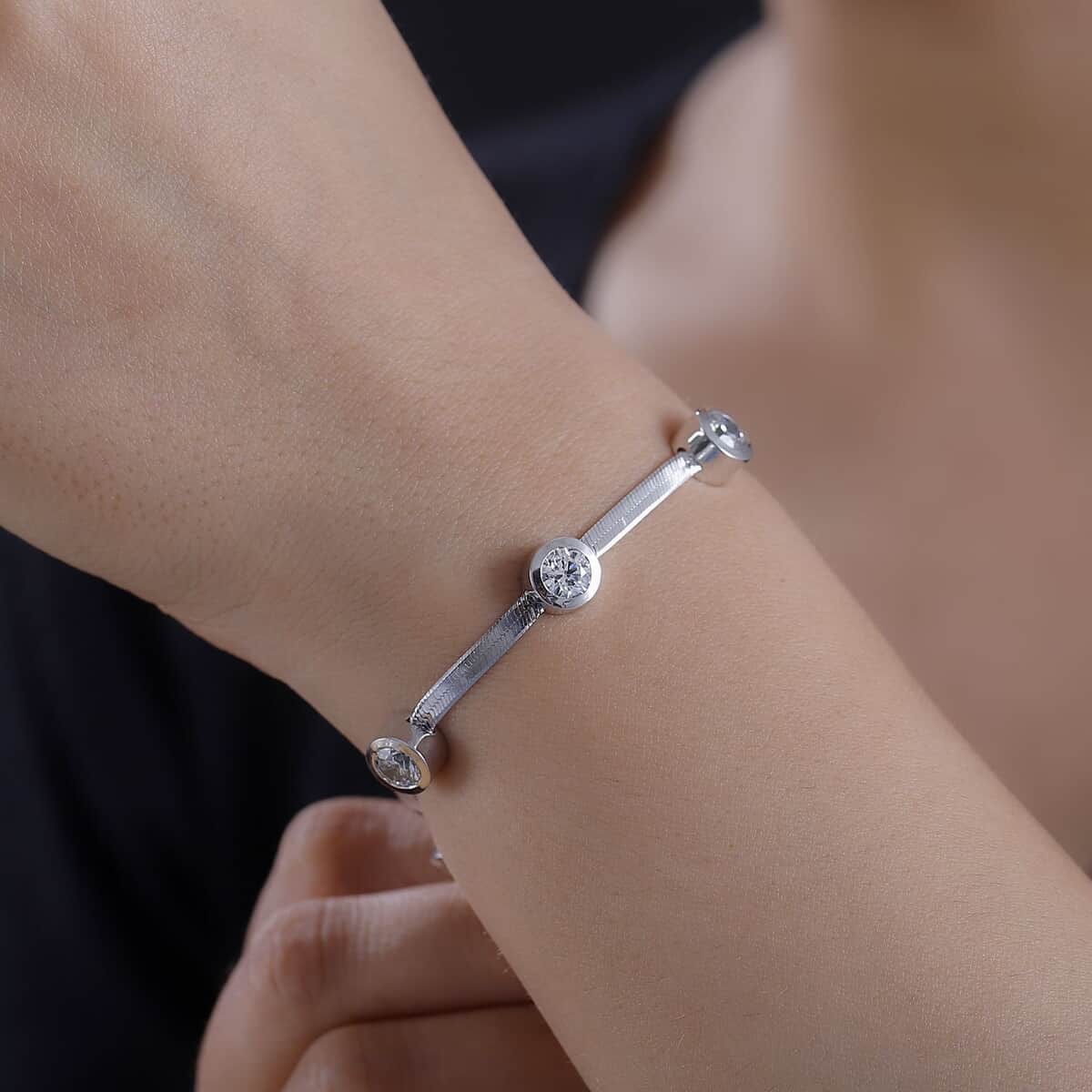 J Francis Embellished with Zirconia by Swarovski 7.40 ctw Herringbone Chain Station Bracelet in Rhodium Over Sterling Silver (6.50-8.00In) image number 2