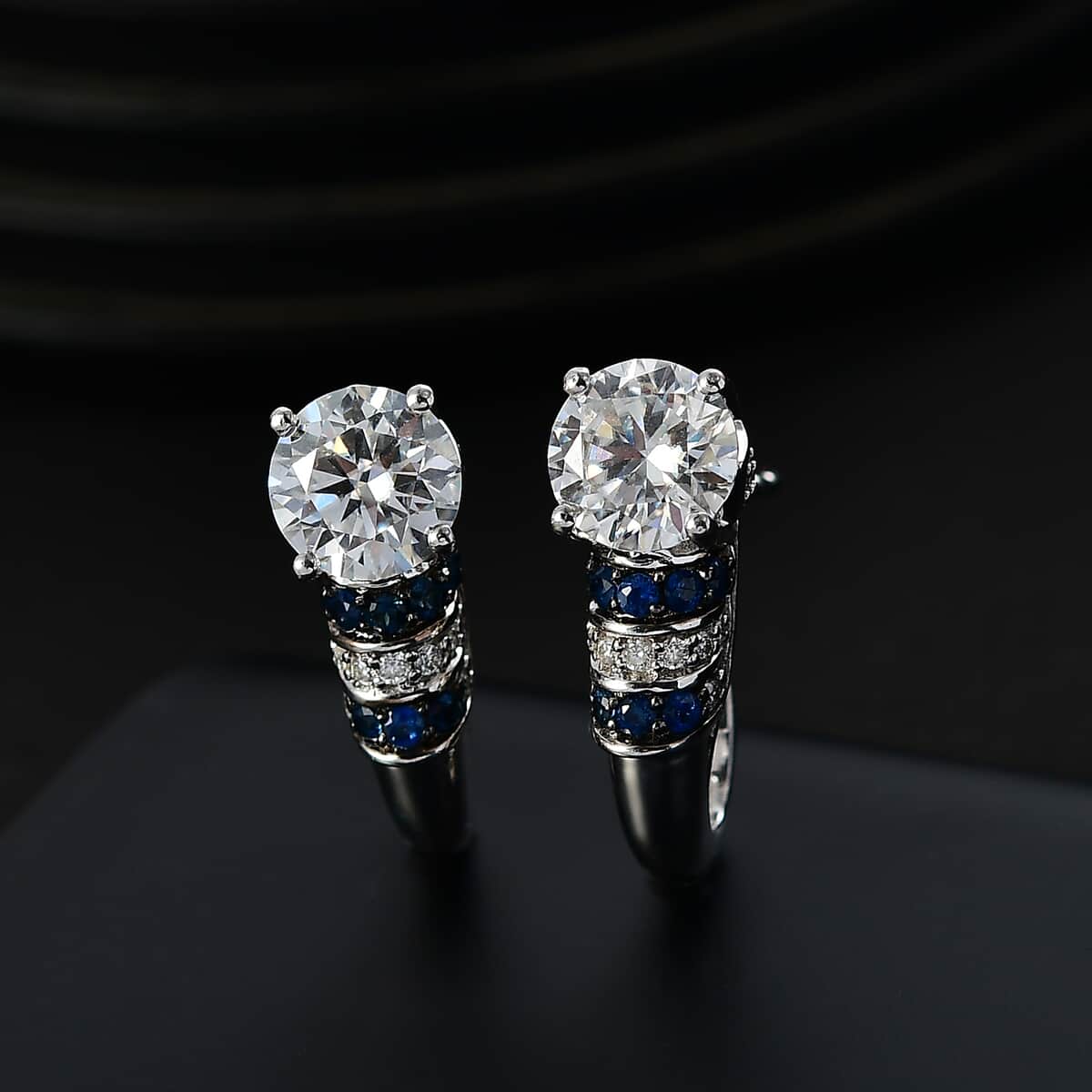 Moissanite and Blue Sapphire 2.90 ctw Moonlit Grace Earrings in Rhodium Over Sterling Silver image number 1