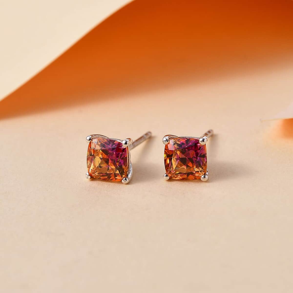 J Francis Embellished with Vibrant Red-Orangy Yellow Zirconia by Swarovski 4.00 ctw Solitaire Stud Earrings in Rhodium Over Sterling Silver image number 1