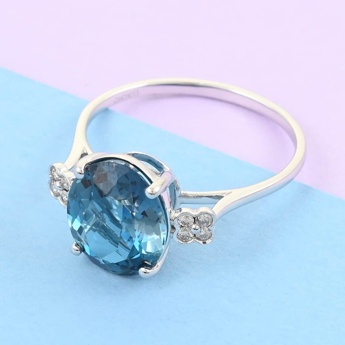 Certified and Appraised Luxoro AAA London Blue Topaz and G-H I1 Diamond 6.00 ctw Ring in 10K White Gold (Size 9.5) image number 1