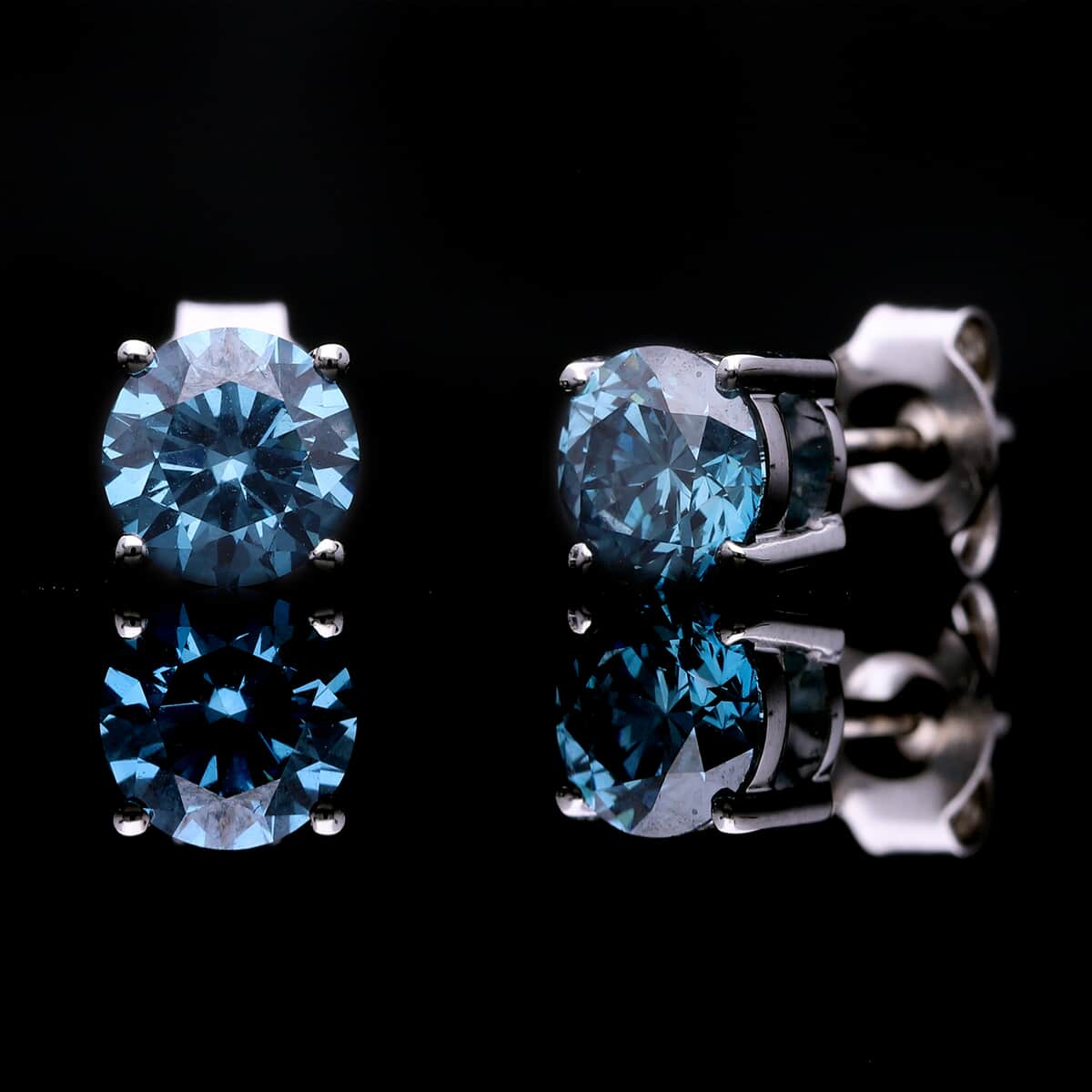 Doorbuster Luxuriant Lab Grown Blue Diamond (SI) 1.40 ctw Stud Earrings in Platinum Over Sterling Silver image number 1